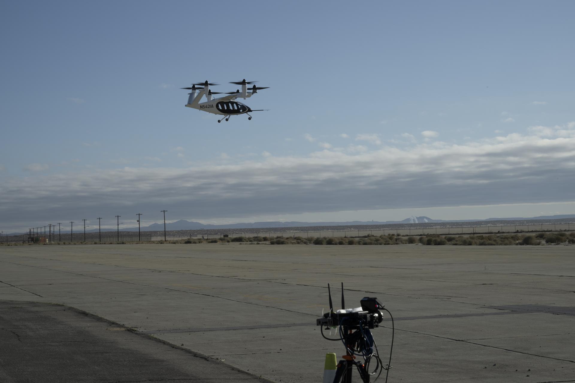 Joby experimental electric air taxi flying above NASA's test site in California